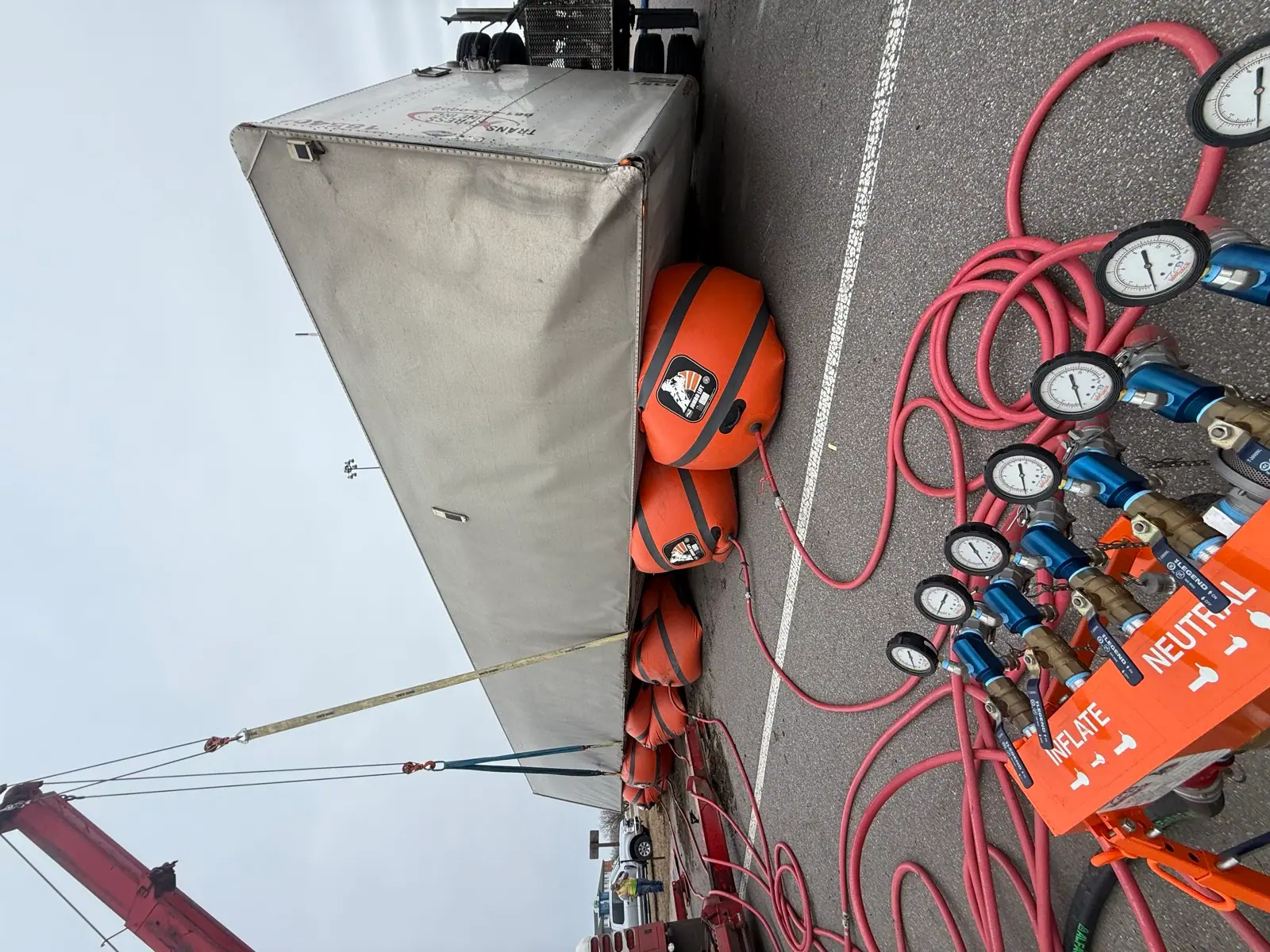 Air cushions lifting an overturned trailer
